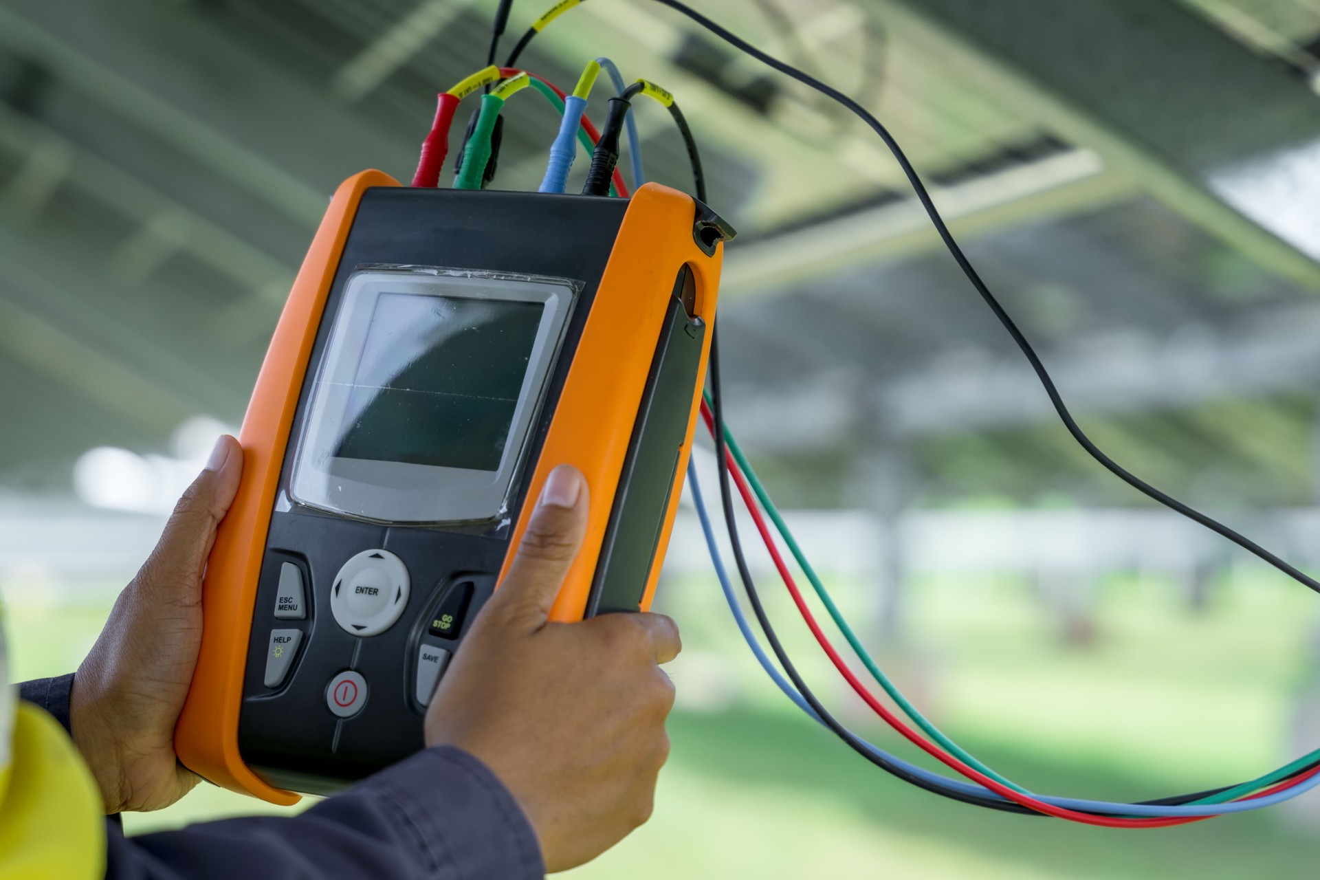 Engineers are checking the solar panels with a performance checker to verify that each solar panel is working at full efficiency. Alternative energy to conserve the world's energy. renewable business